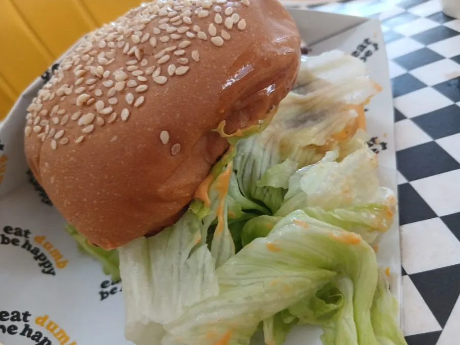 Eating the cheese-added burger