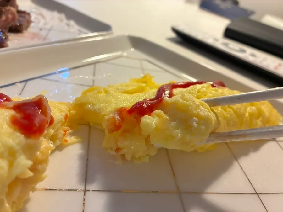 Cross-section of the omelet filled with cheese