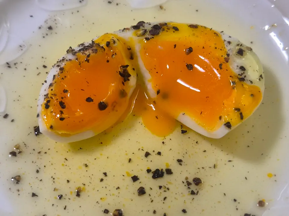 Thick yolk visible in the soft-boiled free-range fertilized egg