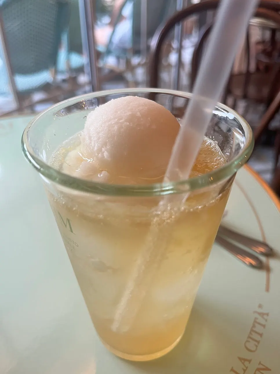 Sparkling drink topped with lemon sorbet