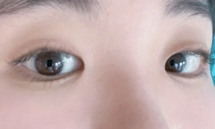 Made-up eye look after brown extensions