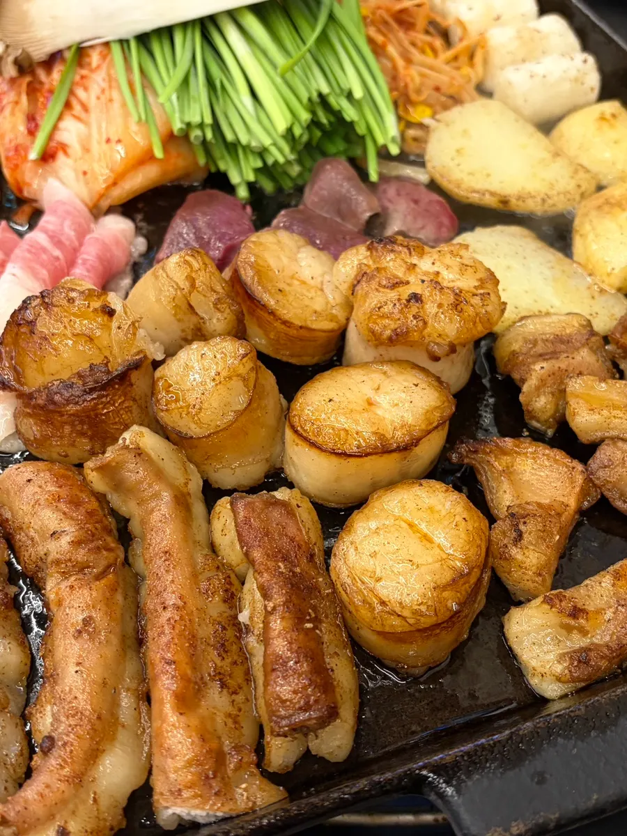屯山洞のコプチャンと会食の案内写真