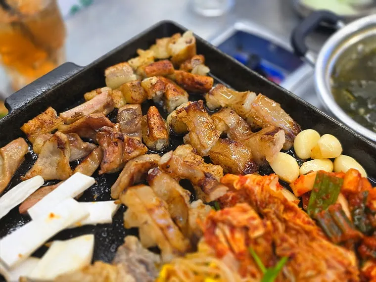 Mixed gopchang being cooked at the table
