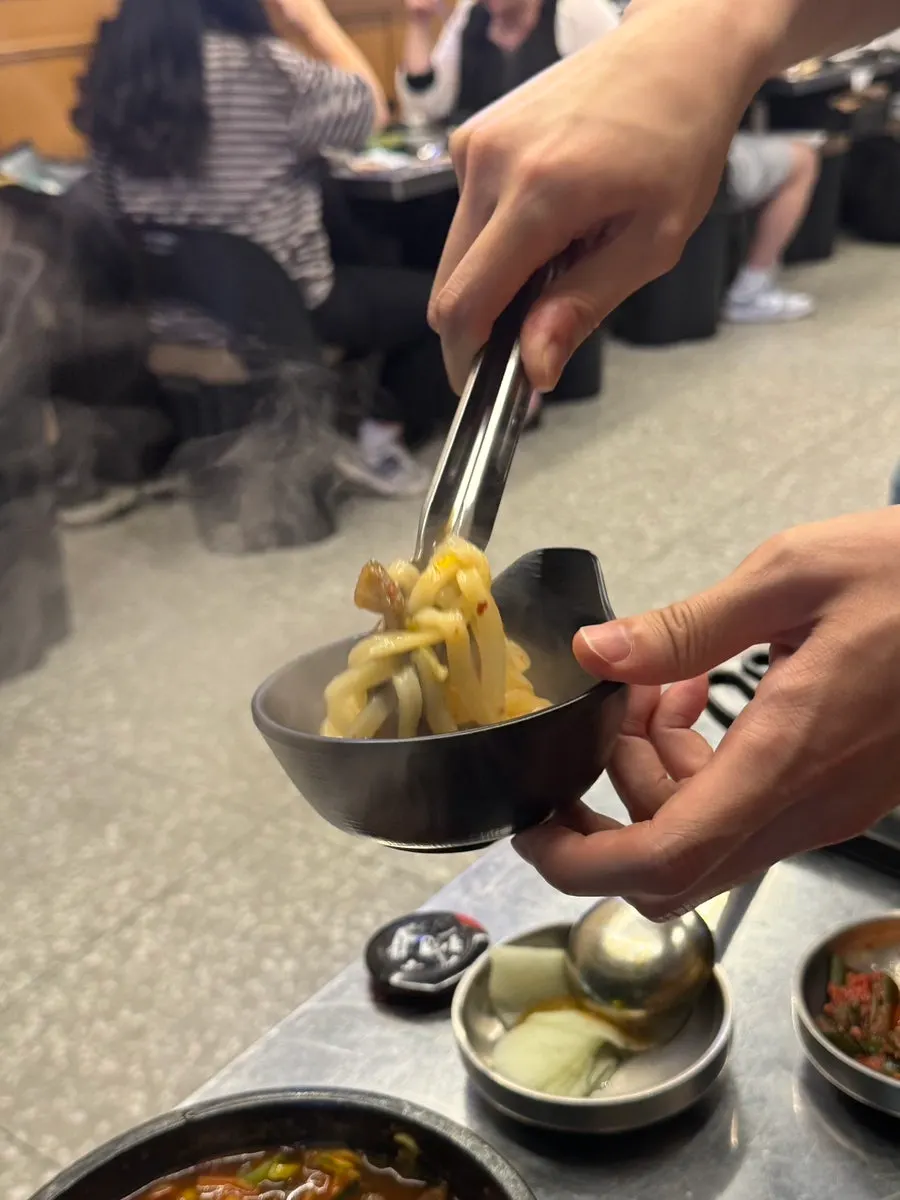 Yukgaejang kalguksu with peppery broth
