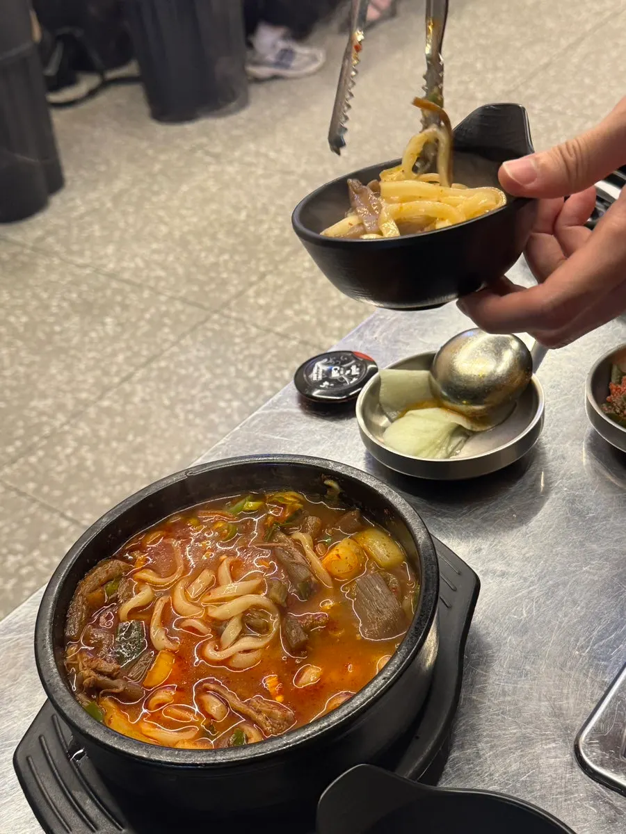 Yukgaejang kalguksu ordered as a side dish