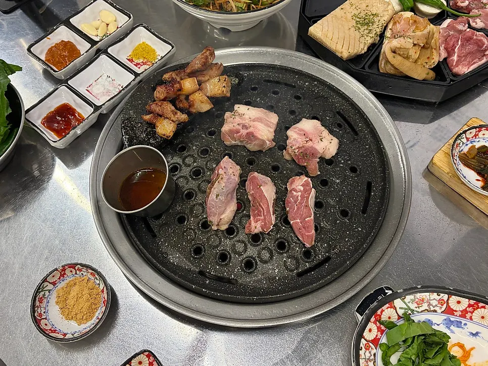 A fully grilled piece of rare-cut pork