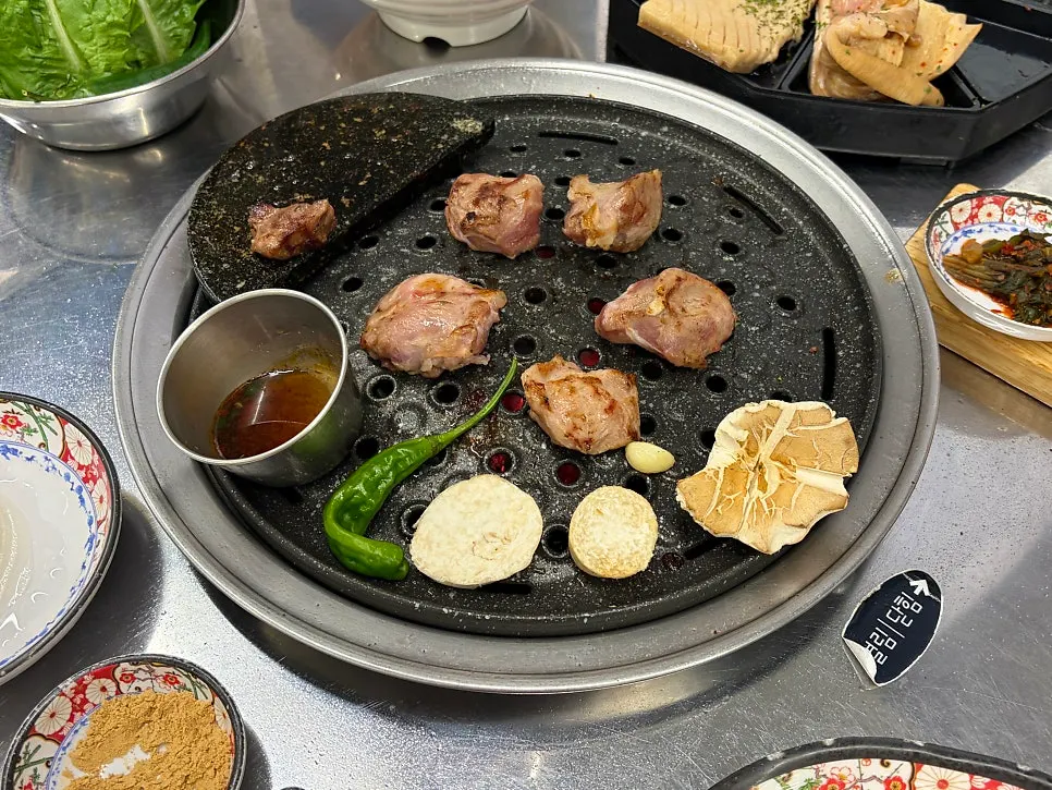 Grilled meat eaten together with bibim noodles