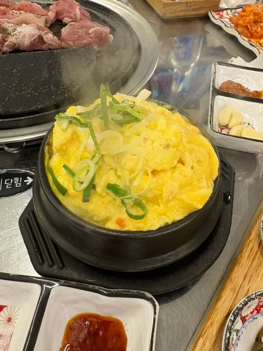 Several cuts grilling together on the pan