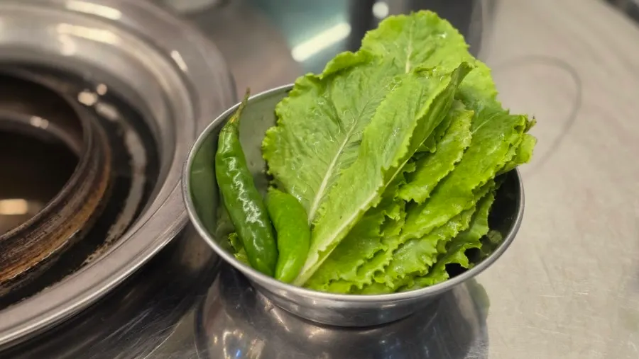 A plate of side dishes taken from the self-serve bar