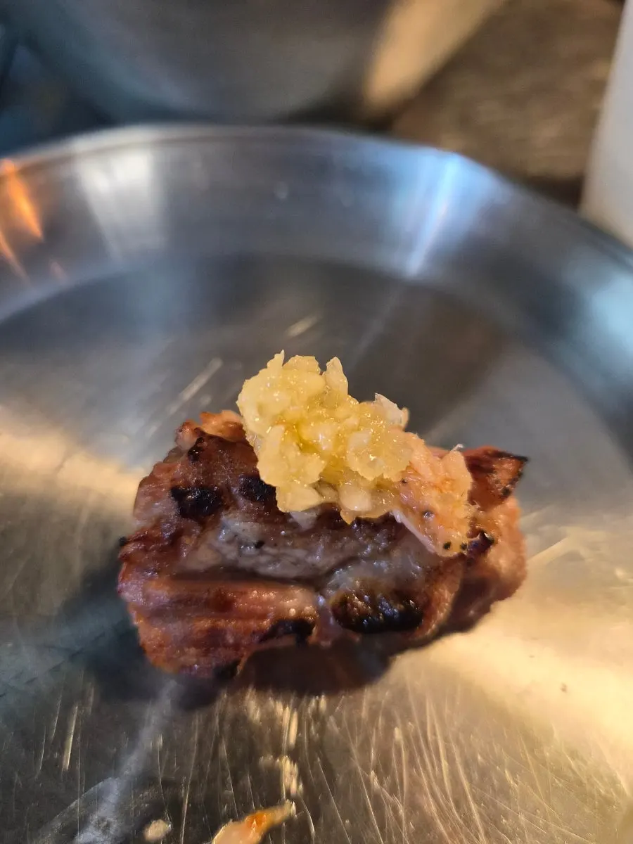 A piece of golden-grilled Jeju pork neck