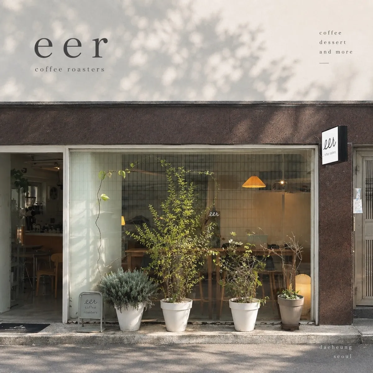 Exterior of Ieo Coffee Roasters Gongdeok Branch in a Daeheung-dong alley