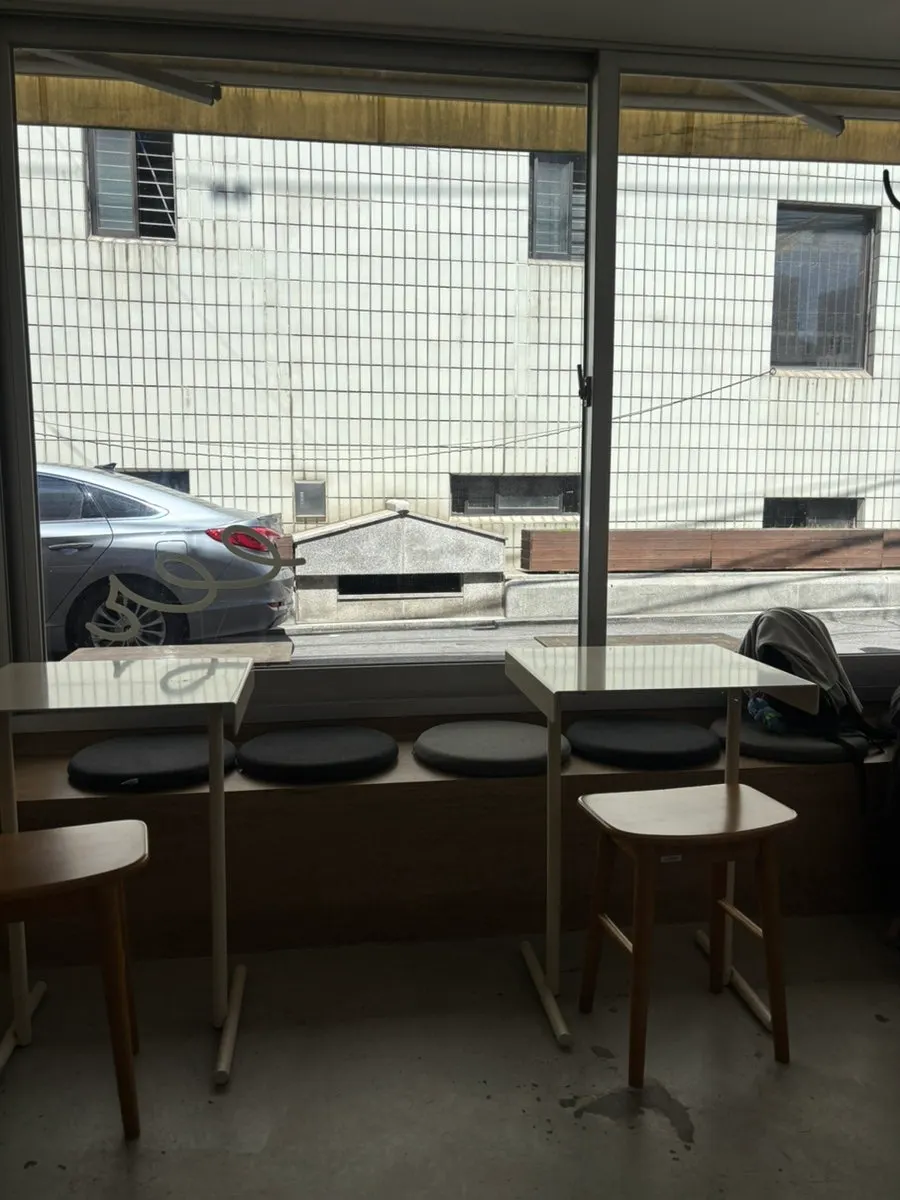Café seating with wood-tone furniture and decor