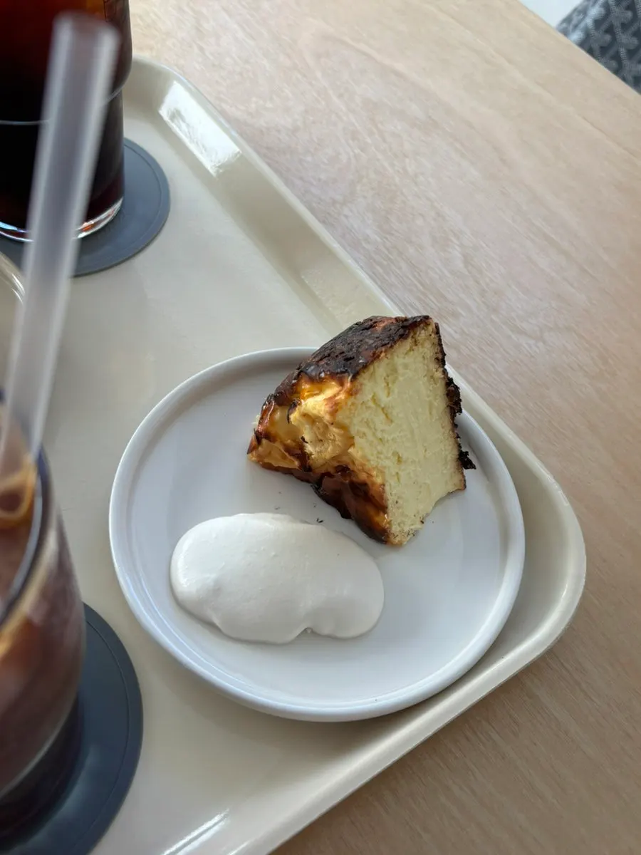 Cross-section of Basque cheesecake with a deeply charred top