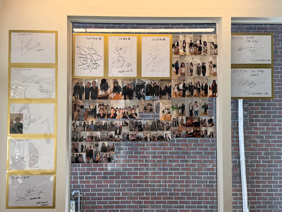 Eoseuni Spa wall with visitor photos and signatures