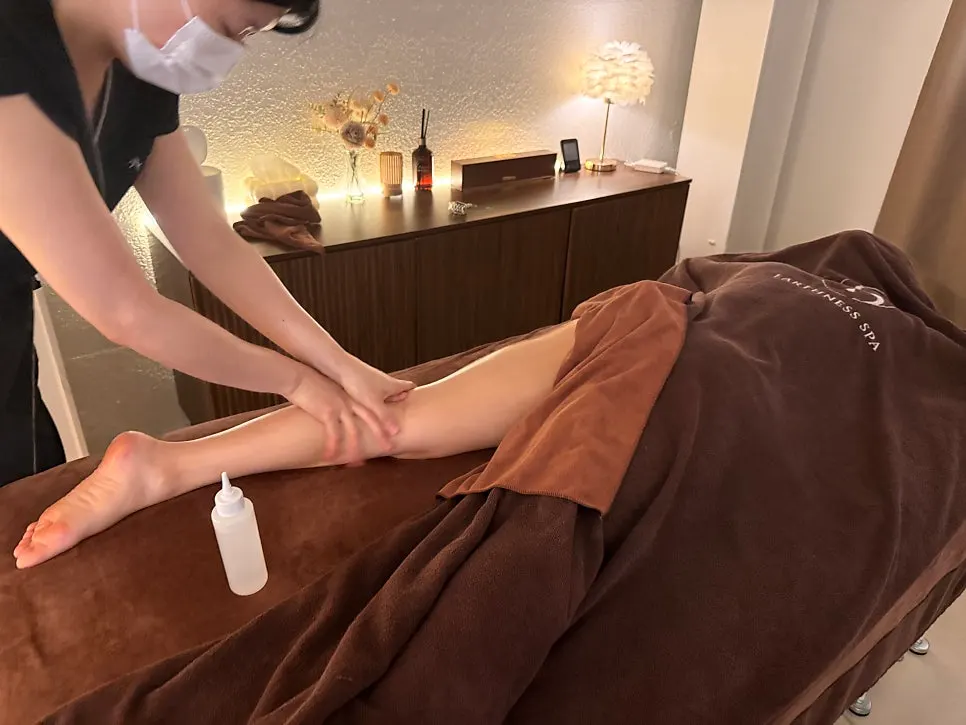 Oil-based back body treatment in progress