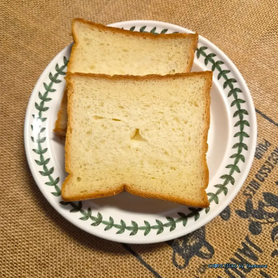 Two kinds of milk bread served at the breakfast table the next morning