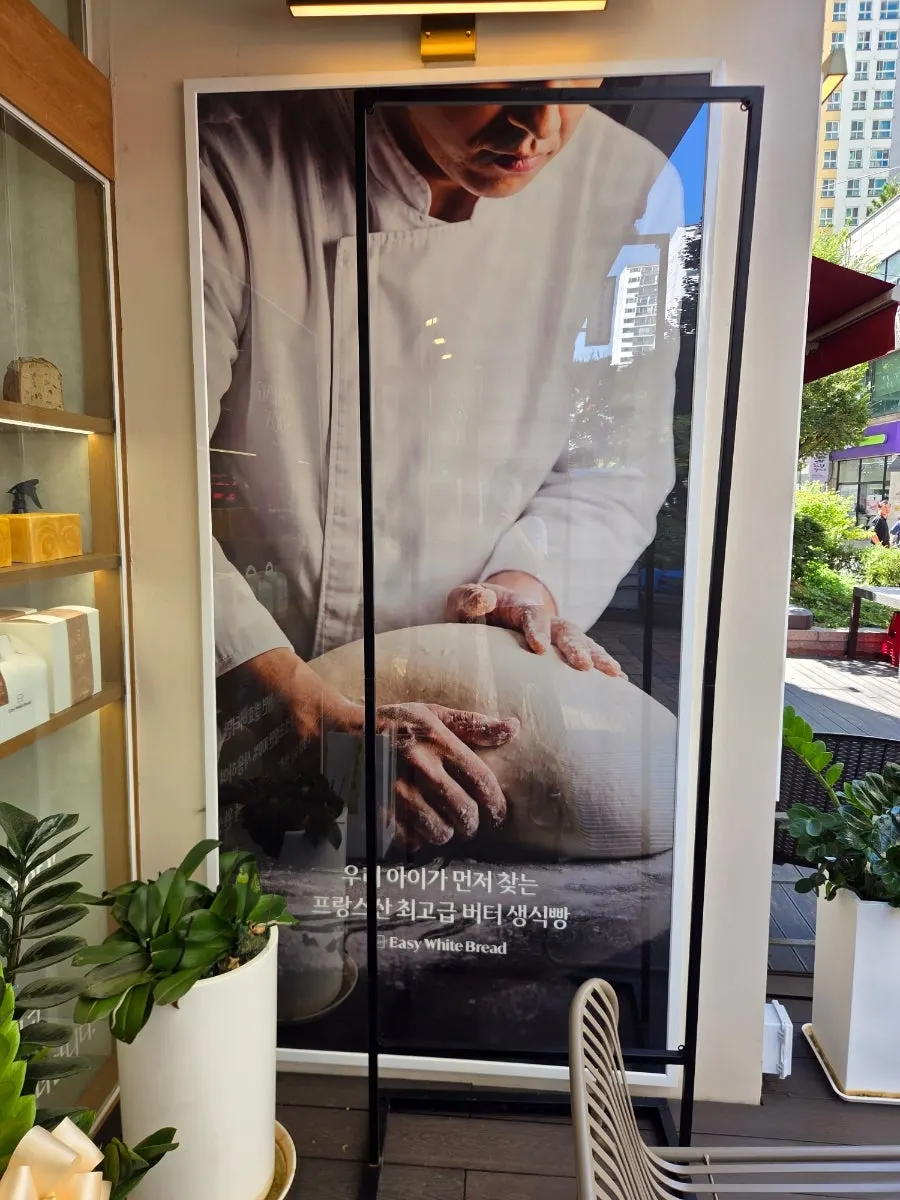 Coming soon sign for deep chocolate milk bread on the storefront