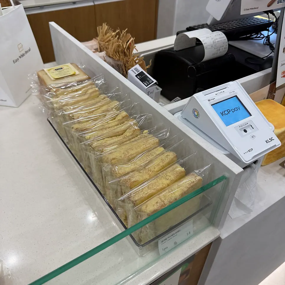 Fresh cream castella bread on display nearby