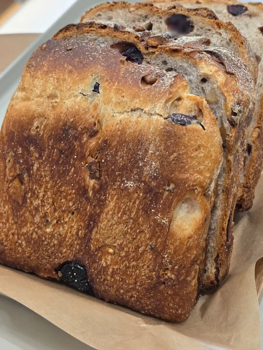 A slice of milk bread topped with cream cheese