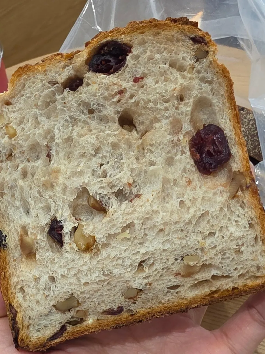 Inside texture of the walnut cranberry rye milk bread