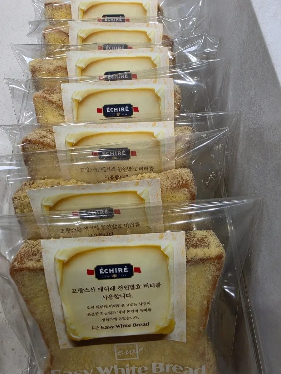 Whole loaves of milk bread on the display shelf