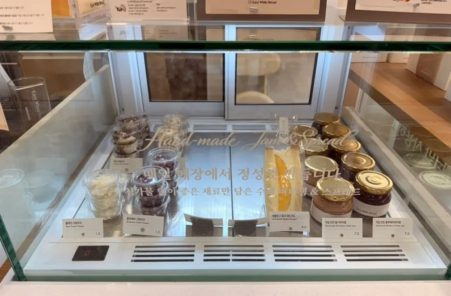 House-made jam and cream cheese on display