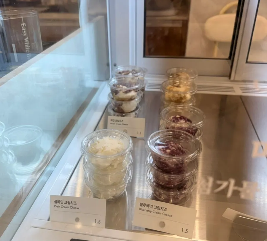 Containers of plain and honey fig cream cheese