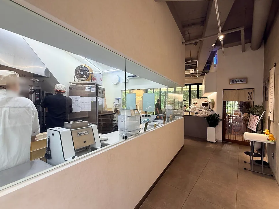 Open kitchen where bread is being baked