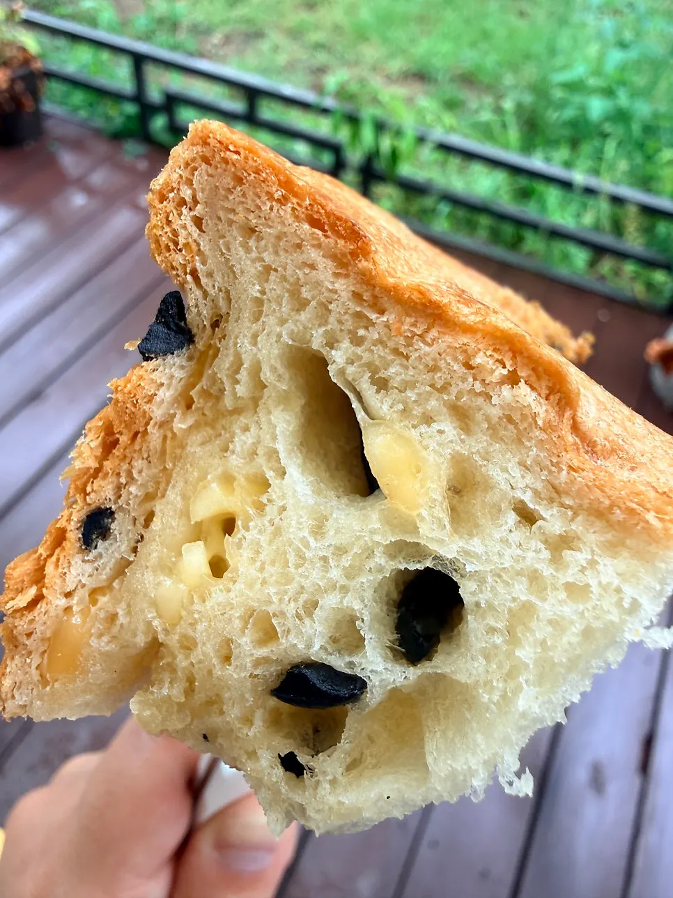Cross-section of warm olive cheese milk bread