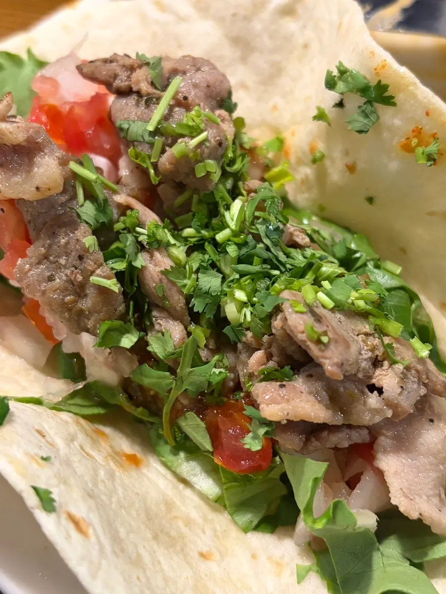 Taco fillings wrapped in a tortilla