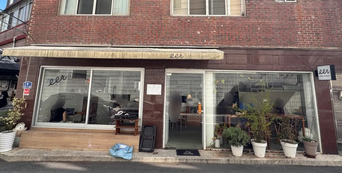 Ground-floor café exterior in a red brick building