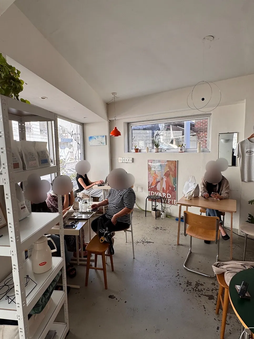 Café tables arranged with ample spacing
