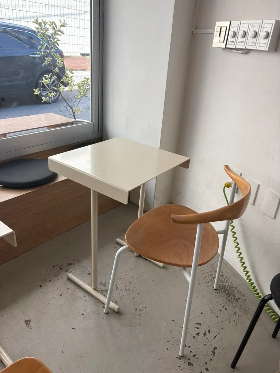 Quiet indoor seating with tables for two and four