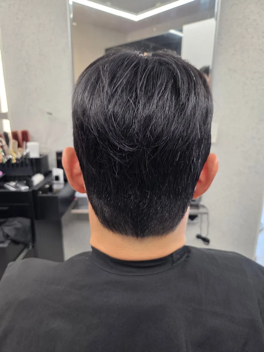 Back view neatly finished after the down perm