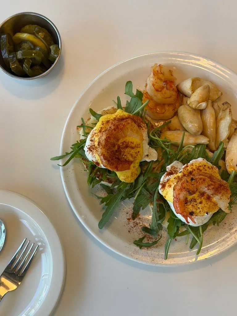 Eggroom's egg benedict before popping the poached egg