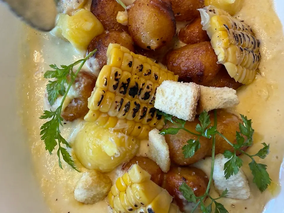 Close-up of Eggroom's corn cream gnocchi