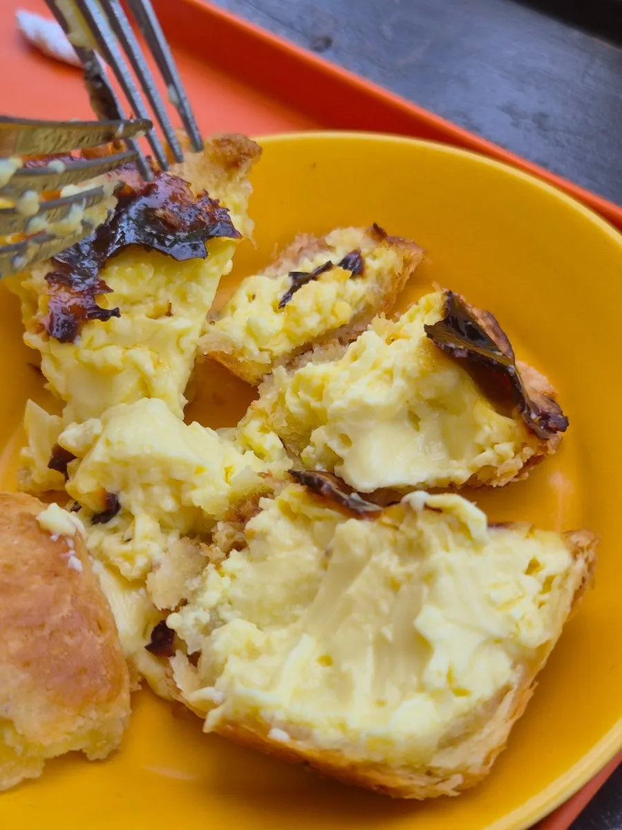 A bite taken out of the egg tart