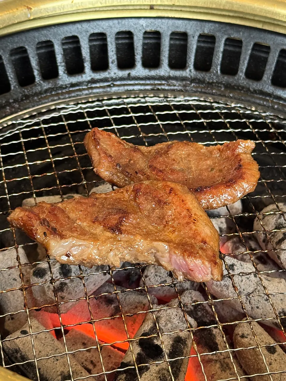 Pork ribs grilled by staff on the grill plate