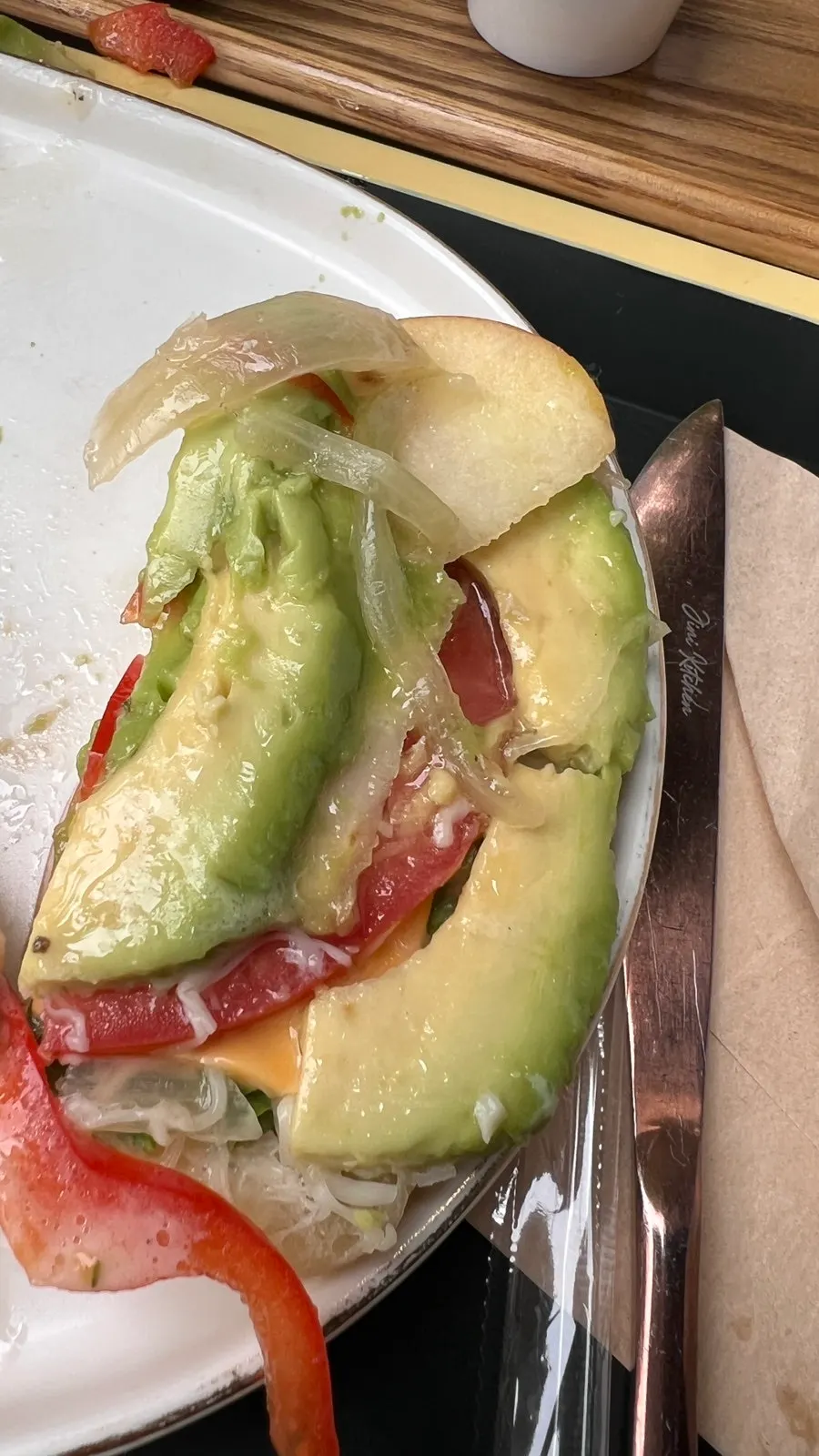 Cross-section of the sandwich showing thick avocado slices