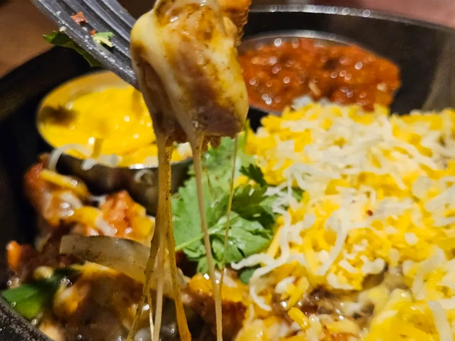 Plump cooked shrimp on the fajita pan