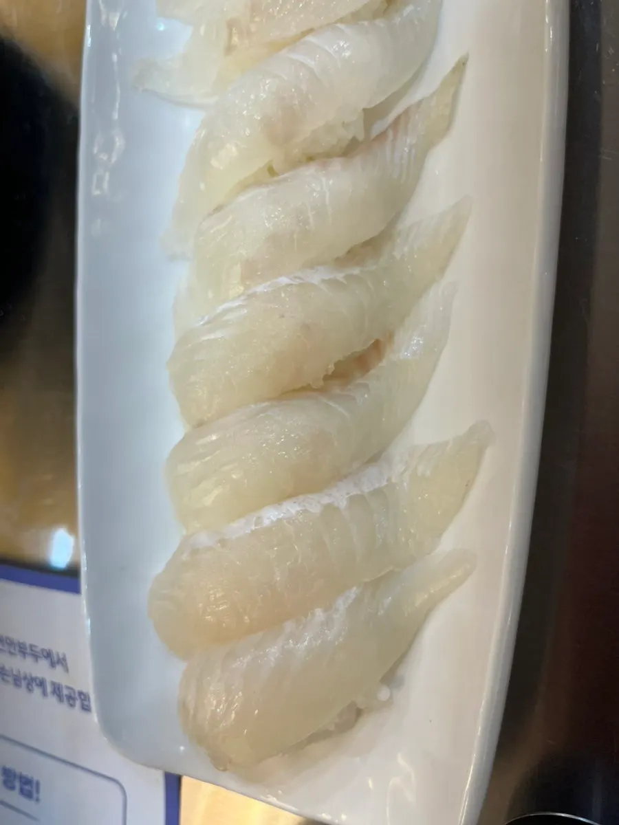Close-up of glossy flounder sushi