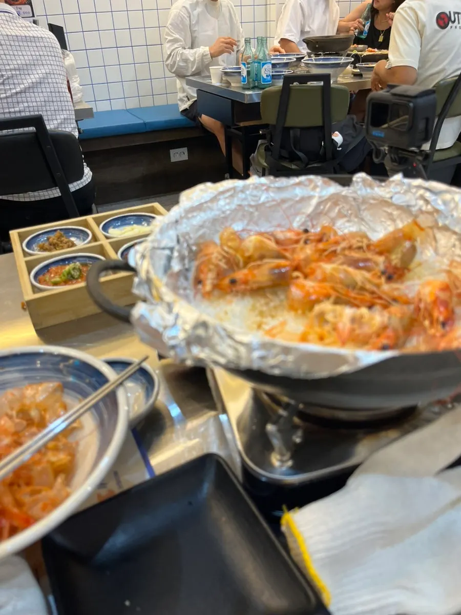 End of meal scene with soju visible on the table