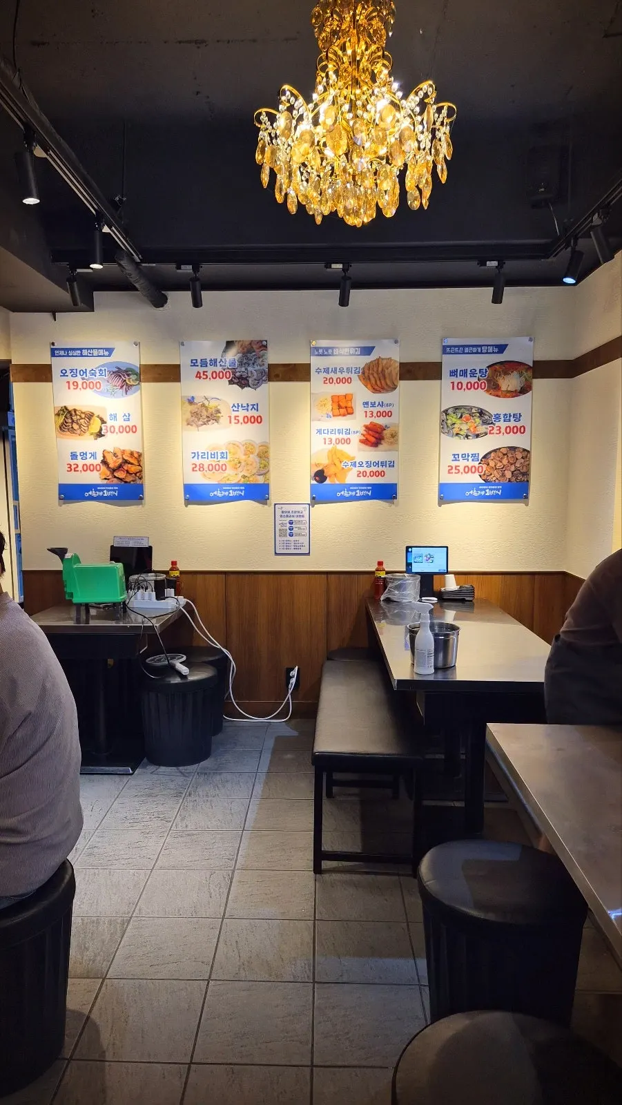Interior of the restaurant, fairly full of customers