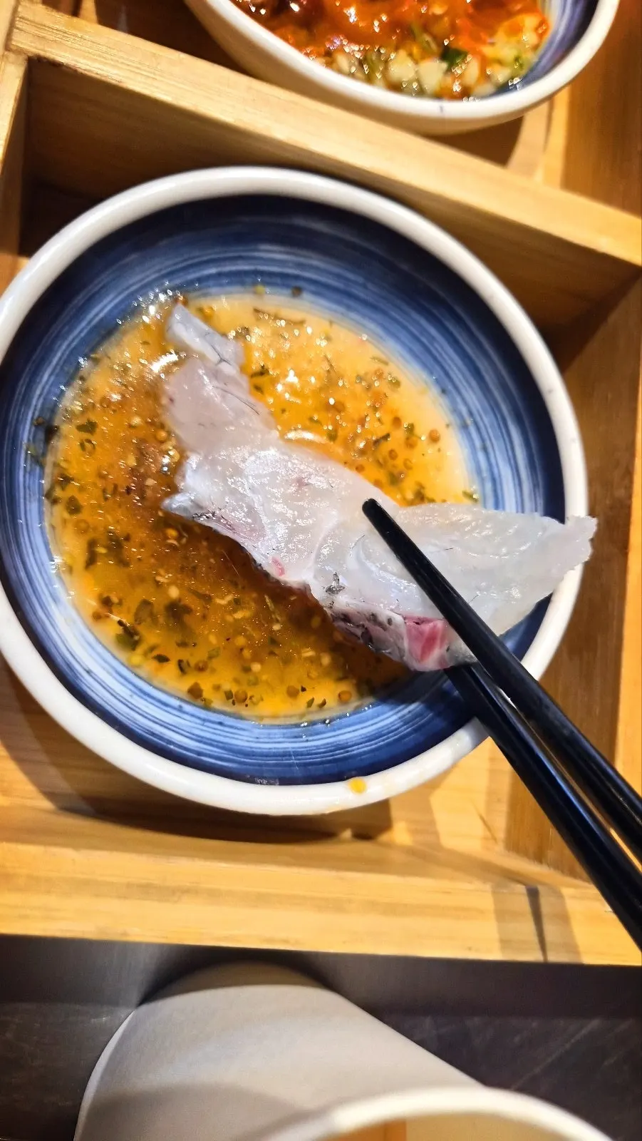 Thickly sliced red snapper sashimi