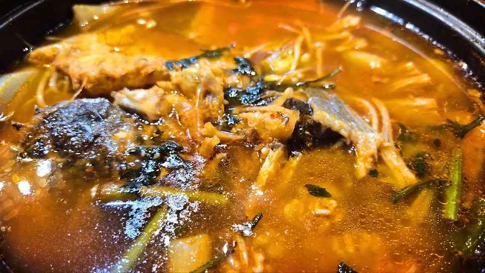 Bubbling spicy fish stew
