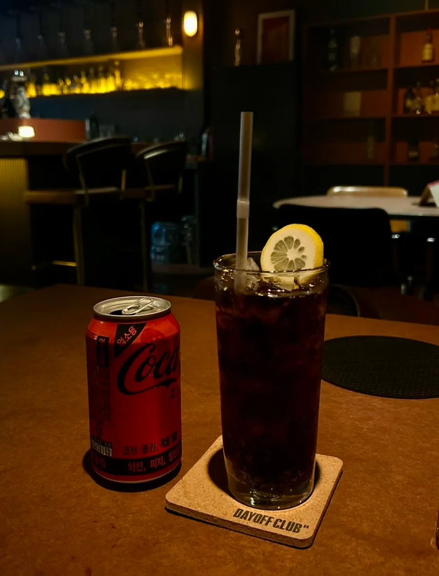 Zero-sugar cola ordered alongside the mimosa
