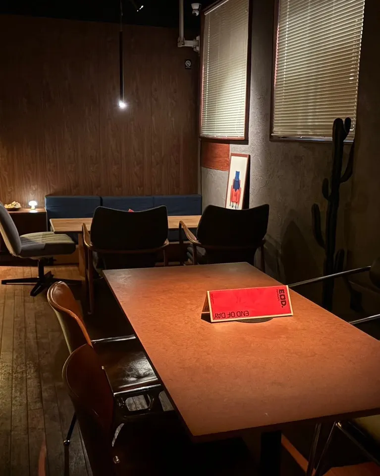 Dimly lit seating area inside EOD Hannam