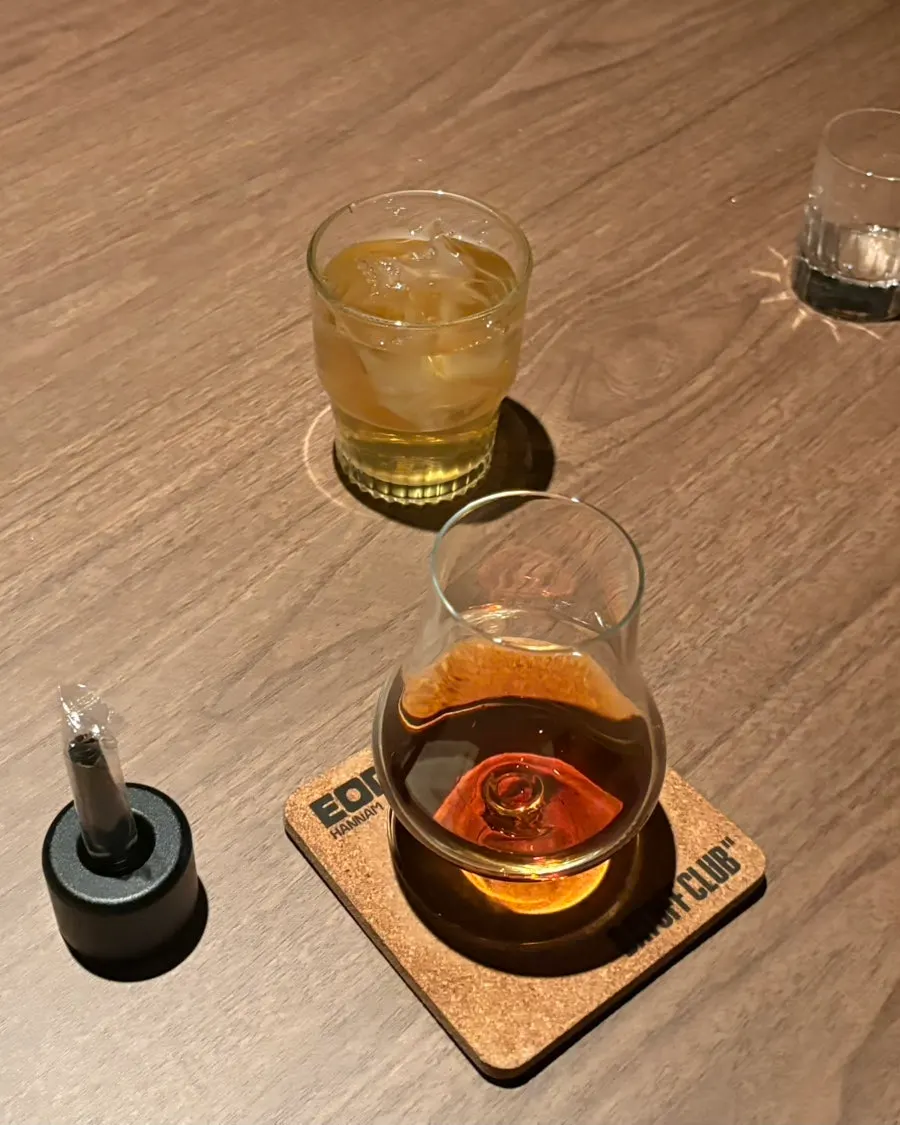 Peppermint tea served in a large glass