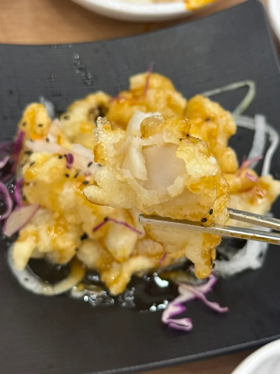 Kodari sweet and sour dish served with sauce