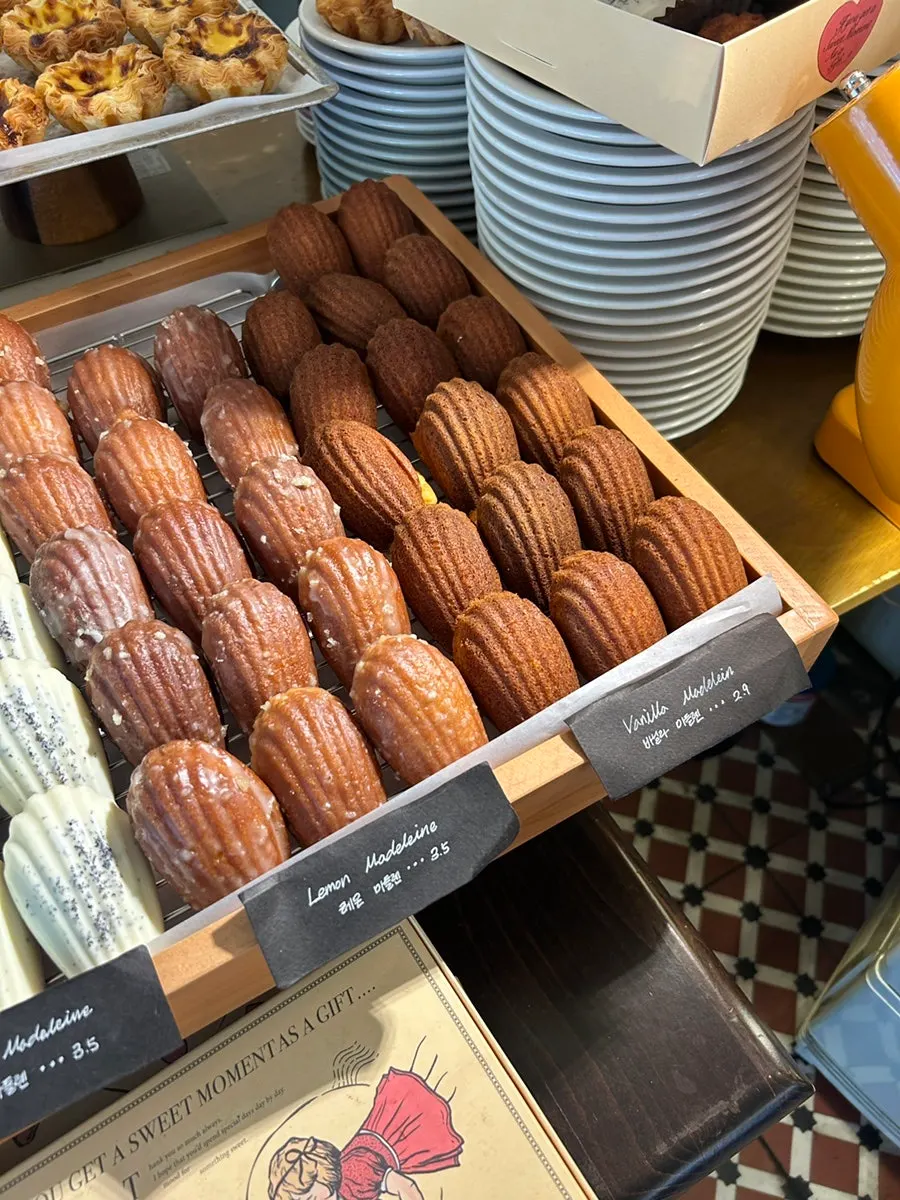 Pound cakes and hand-made cookies on the bakery shelf
